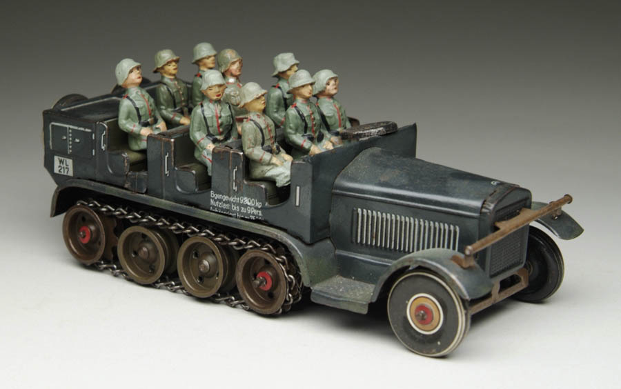 Appraisal: LINEOL MILITARY TRANSPORT VEHICLE Gray lithographed with wheels with chain