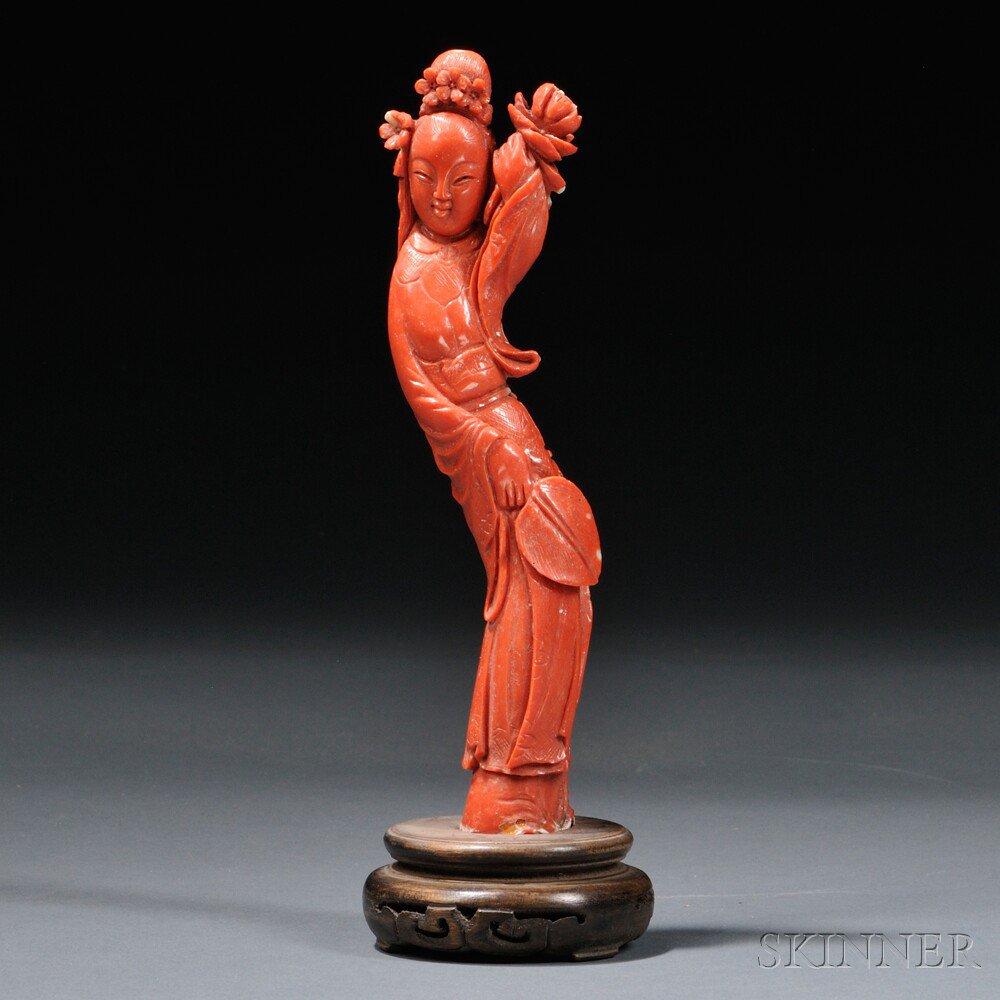 Appraisal: Coral Figure of Guanyin China th century carved from red