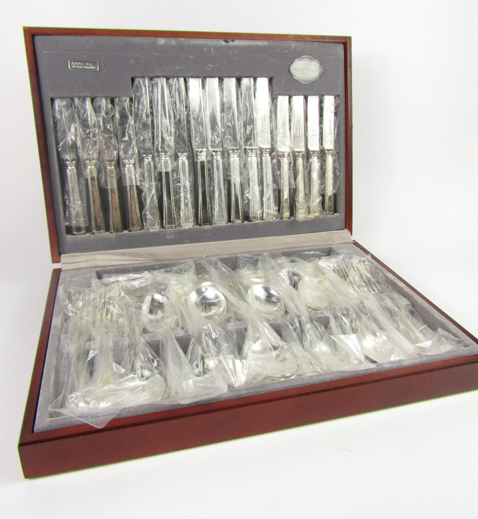 Appraisal: A Cooper Ludlam silver plated port canteen of plated cutlery