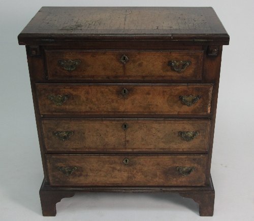 Appraisal: A bachelor's walnut chest the top cross banded and with