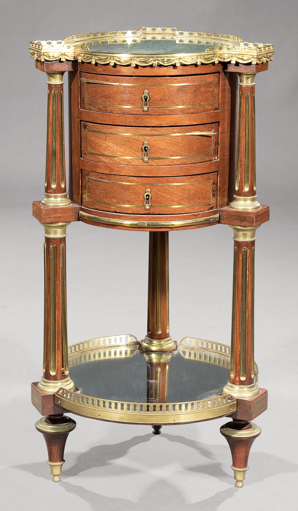 Appraisal: Louis XVI-Style Brass Inlaid Mahogany Occasional Table th c mirrored