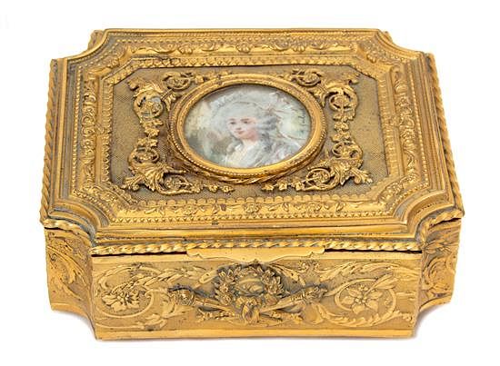 Appraisal: A French Gilt Metal Portrait Jewelry Casket Height x width