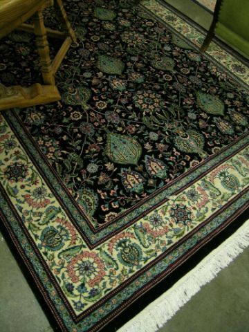 Appraisal: ' x ' oriental rug Pak-Kashan black field cream border