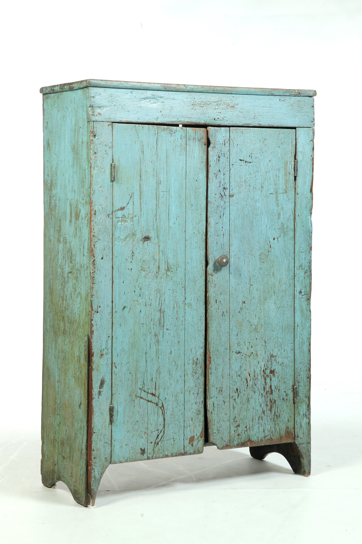 Appraisal: AMERICAN DIMINUTIVE CUPBOARD Nineteenth century pine Two plank doors and