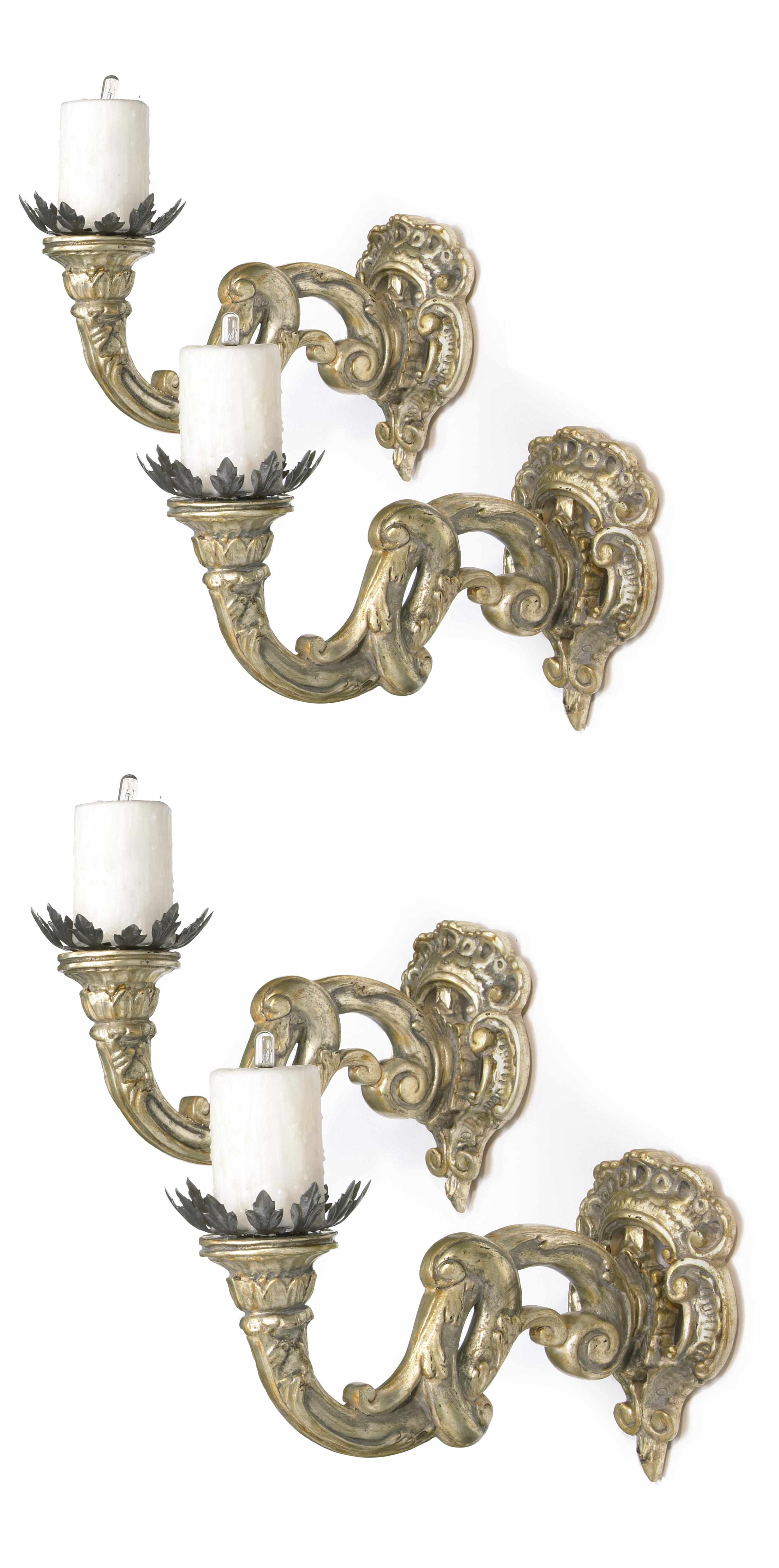 Appraisal: A set of four Baroque style carved silvered wood wall