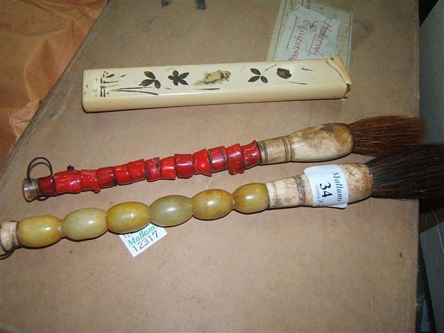 Appraisal: A beaded jade and ivory Chinese paintbrush and a further