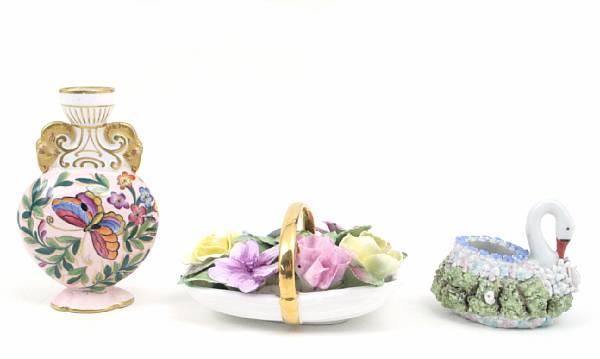 Appraisal: A group of eight porcelain floral encrusted table articles by