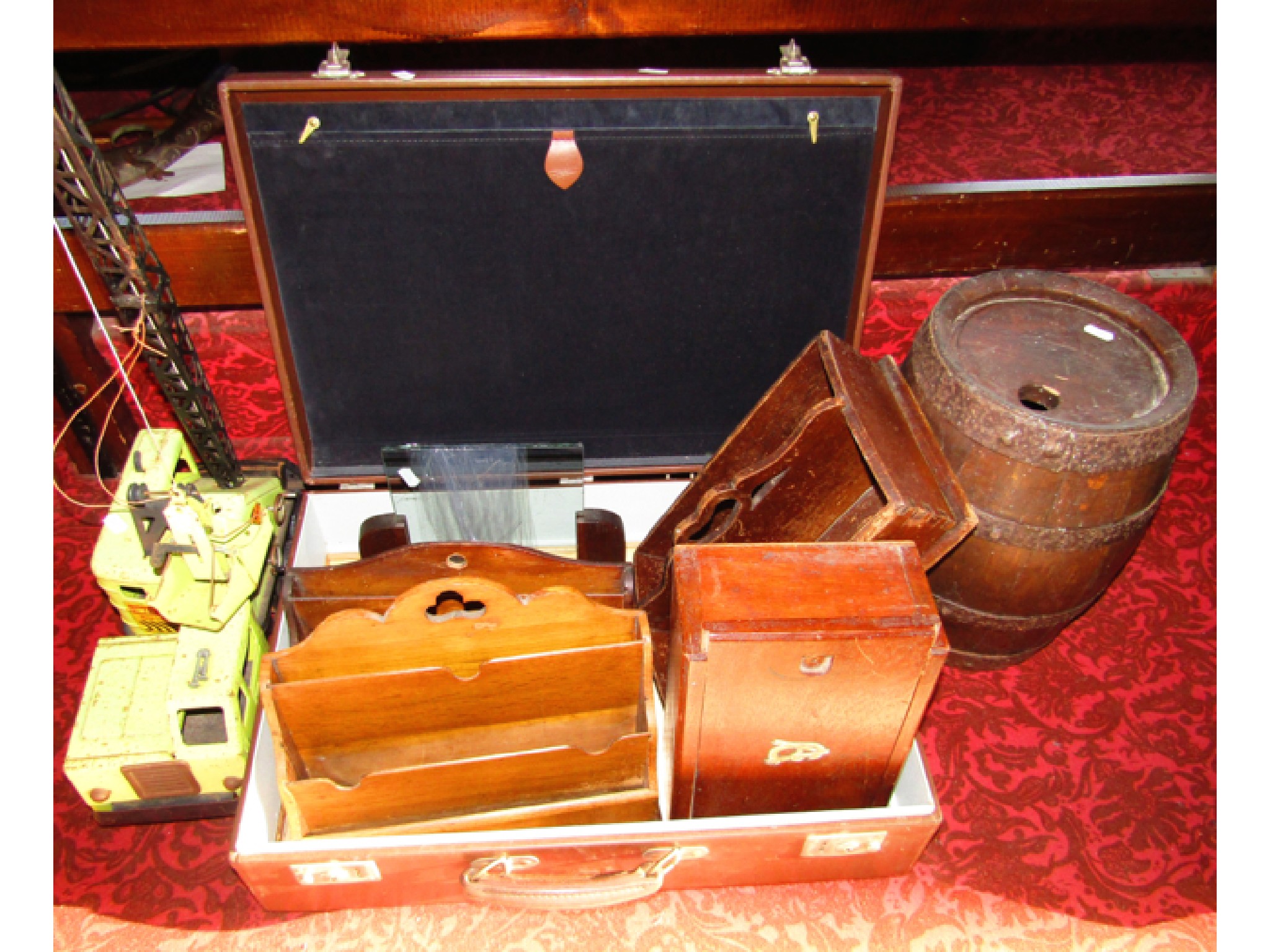 Appraisal: A vintage suitcase containing timber document shelves a stained timber