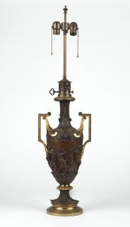 Appraisal: A French gilt and patinated bronze table lamp th century