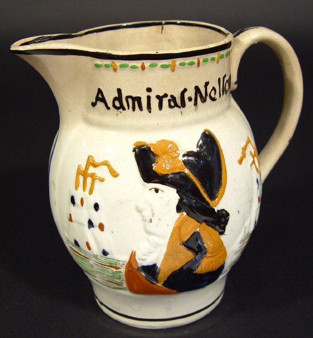 Appraisal: th century Staffordshire Nelson jug with relief moulded and hand