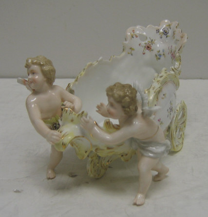 Appraisal: GERMAN PORCELAIN FIGURE GROUP Rococo style carriage with two putti