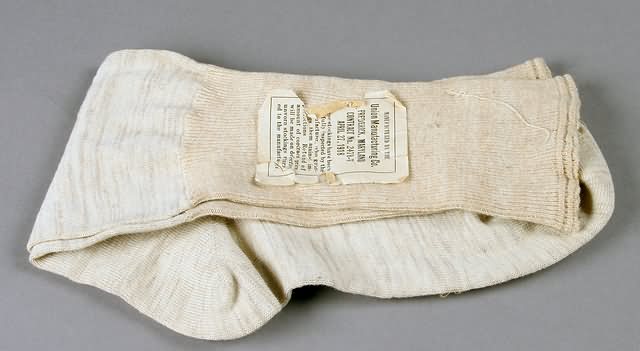 Appraisal: pair of WWI cotton socks with original paper label dated