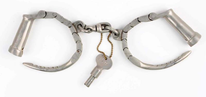 Appraisal: Hiatt Flexible Darby Handcuffs Circa 's Includes original key Stamped