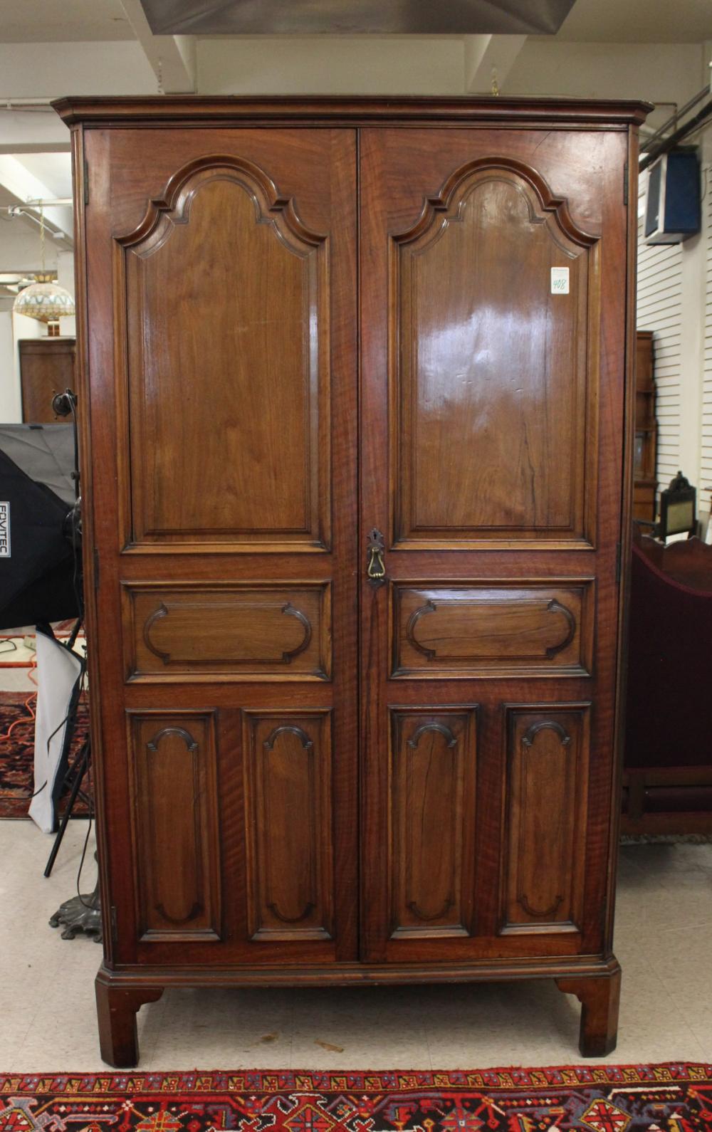 Appraisal: GEORGE III STYLE DOUBLE-DOOR WALNUT WARDROBE English c the panel