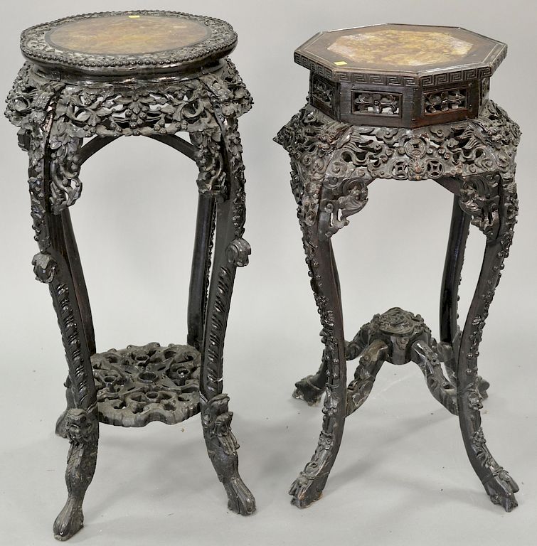 Appraisal: Two Chinese carved stand with inset marble tops ht in