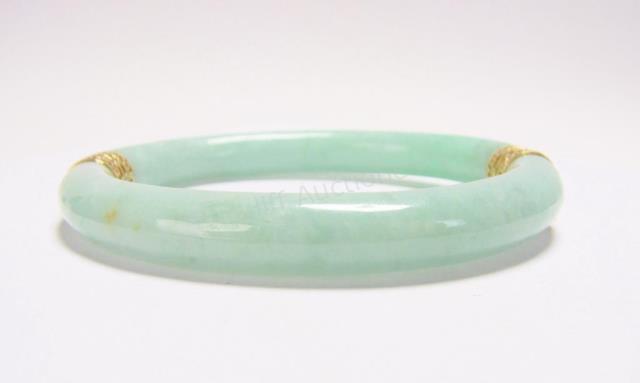 Appraisal: A Jade Bangle bracelet with K yellow gold approximately x