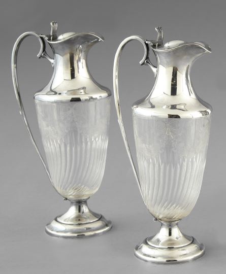 Appraisal: Pair of George V Silverplate-Mounted Cut Glass Claret Jugs first