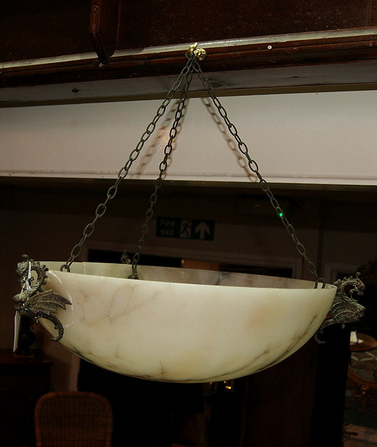 Appraisal: A S ALABASTER CENTRE LIGHT with griffin mounts