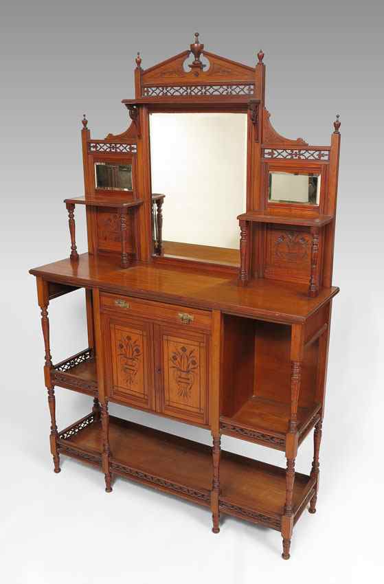 Appraisal: EDWARDIAN SIDEBOARD ETAGERE Top with carved architectural crest with urn