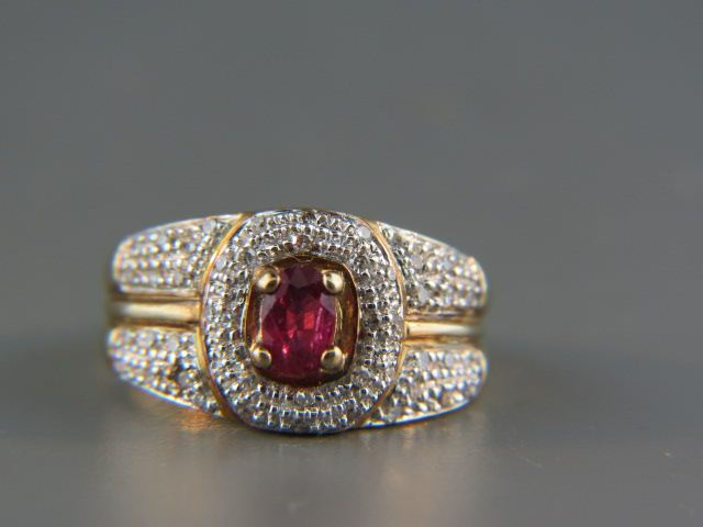 Appraisal: Ruby Diamond Ring oval gem weighing carat with diamonds totaling