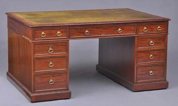 Appraisal: GEORGE III-STYLE CARVED MAHOGANY PARTNER'S DESK The top with gold-tooled