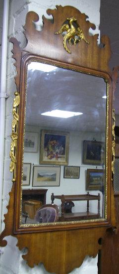 Appraisal: A mahogany wall mirror of th century design the frame