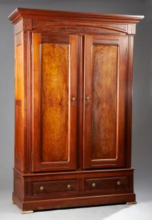 Appraisal: American Eastlake Carved Walnut Armoire c the stepped crown above