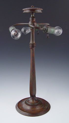 Appraisal: TIFFANY STUDIOS BRONZE LAMP BASE Three socket appears the sockets