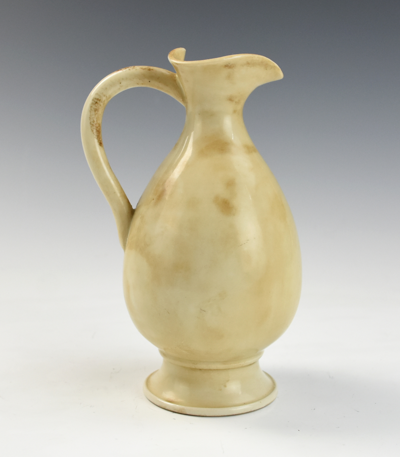 Appraisal: CHINESE WHITE GLAZED PHOENIX HEAD EWER the plain ovoid body