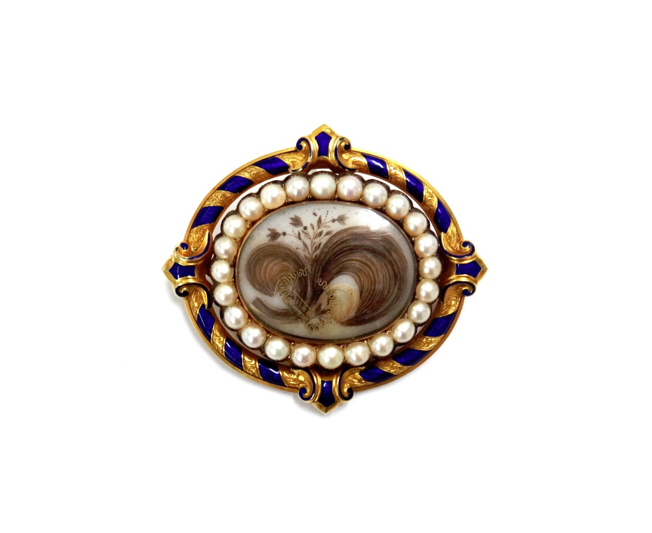 Appraisal: A Victorian gold enamel and half pearl oval memorial brooch