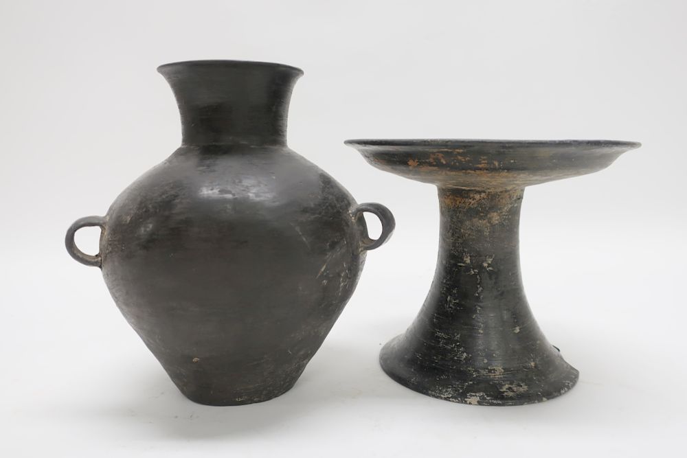 Appraisal: Two Chinese Neolithic Vessels Burnished black pottery of fine potting