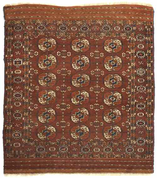 Appraisal: Turkoman carpet ca with overall red field and eighteen small