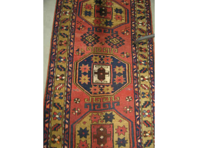 Appraisal: Heriz Persian Handmade Runner five octagon medallions on red field