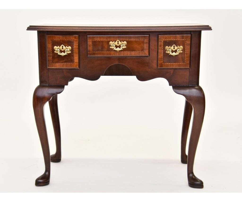 Appraisal: Baker Furniture Company Queen Anne style mahogany inlaid lowboy h