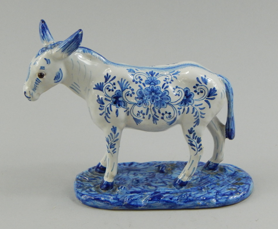 Appraisal: A French Faience pottery model of a donkey or ass