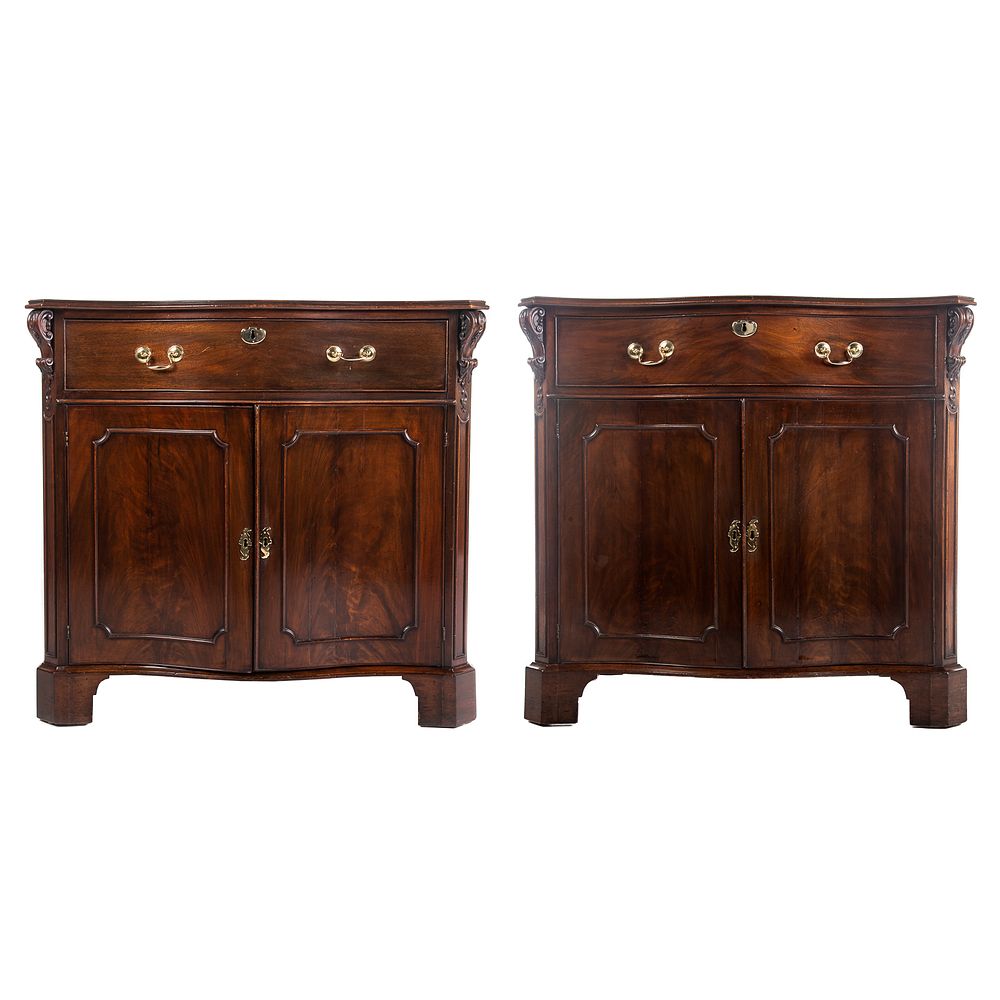 Appraisal: Pair Regency Mahogany Serpentine Cabinets Circa single drawer over cabinet