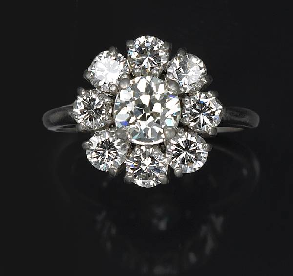 Appraisal: A diamond ring featuring an old European-cut diamond weighing approximately