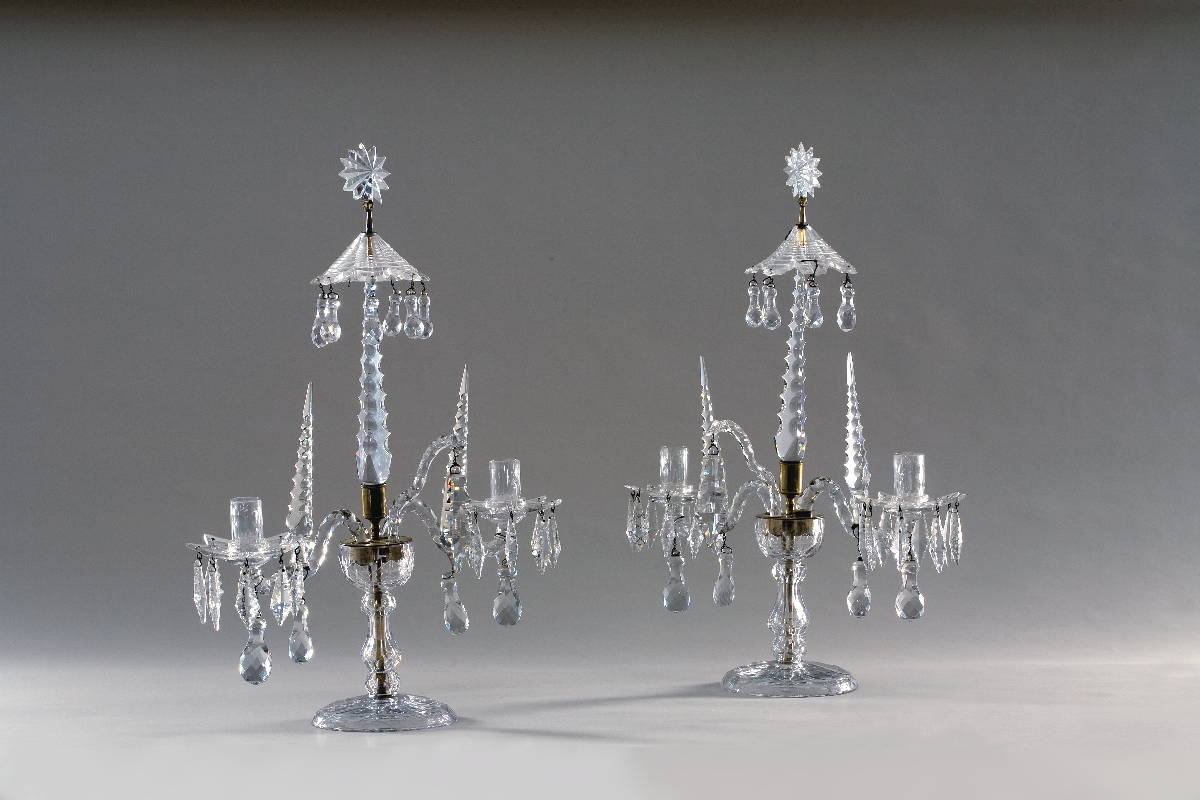 Appraisal: PAIR OF REGENCY CUT-GLASS TWO-LIGHT TABLE CANDELABRA EARLY NINETEENTH CENTURY