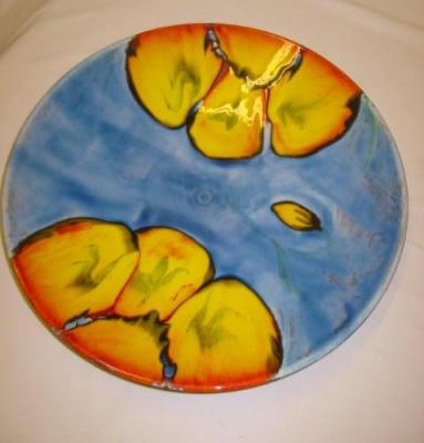 Appraisal: A POOLE POTTERY CHARGER of circular form painted with stylized