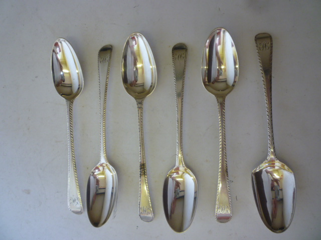 Appraisal: A SET OF FOUR GEORGE III DESSERT SPOONS maker possibly