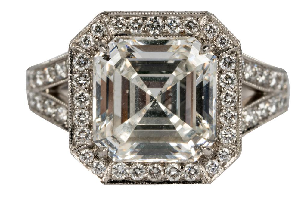 Appraisal: WILLIAM GOLDBERG PLATINUM DIAMOND RINGcentering one square emerald cut diamond