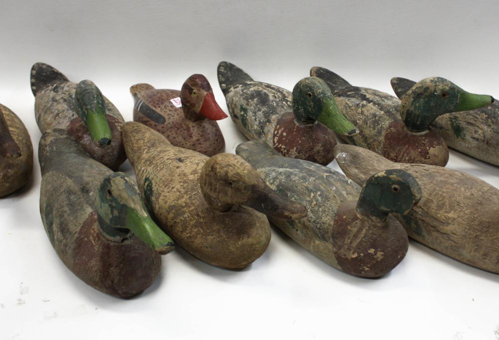 Appraisal: TEN VINTAGE MACHINE TURNED WOOD DUCK DECOYS machine turned bodies