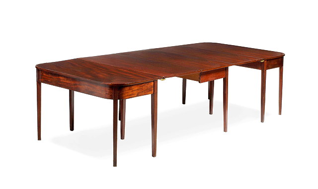 Appraisal: A GEORGE III MAHOGANY DINING TABLE each end with rounded