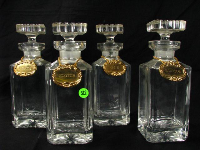 Appraisal: Set of Four Crystal Liquor Decanters with crystal stoppers with