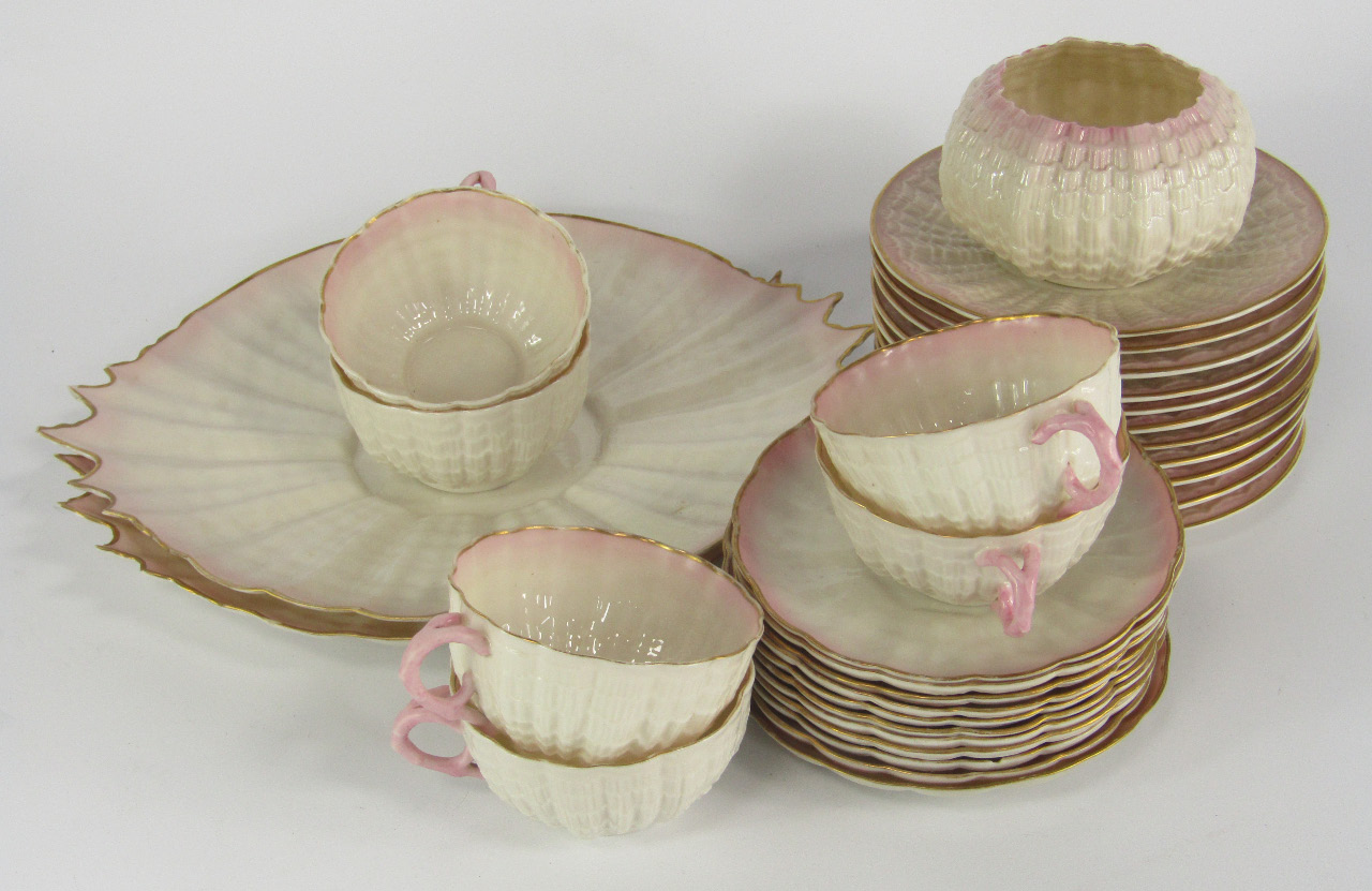 Appraisal: A Belleek porcelain part tea service decorated in the Tridacna