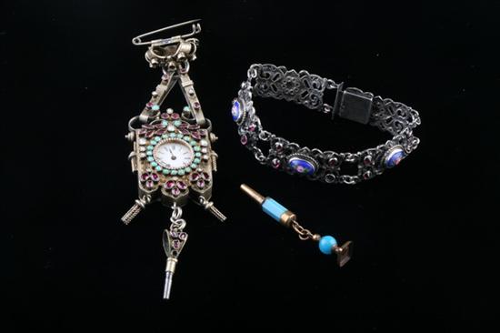 Appraisal: CONTINENTAL SILVER TURQUOISE GARNET AND SEED PEARL RECTANGULAR PENDANT WATCH