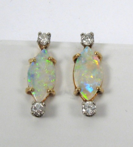 Appraisal: PAIR OF OPAL AND DIAMOND EARRINGS each k yellow and