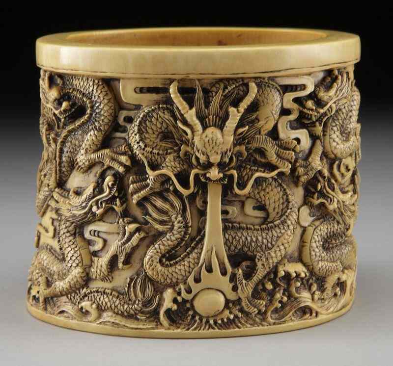 Appraisal: Chinese Qing carved ivory brush pot depicting International buyers should