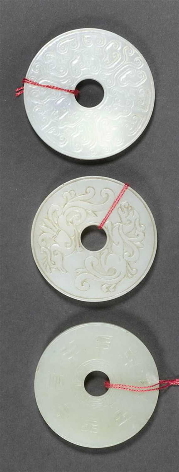 Appraisal: THREE BI DISCS WHITE AND PALE GREEN JADE China th