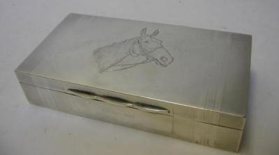 Appraisal: A CIGARETTE BOX Birmingham of plain rectangular form the hinged